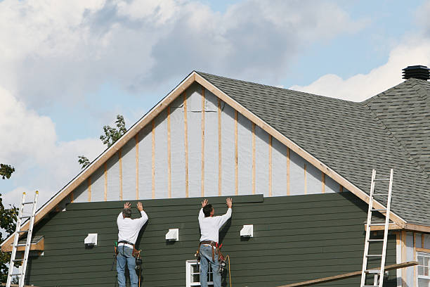 Professional Siding Installation technician working in Manor, PA